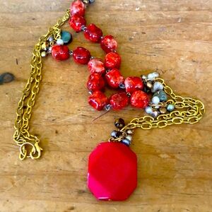 Long red and gold necklace